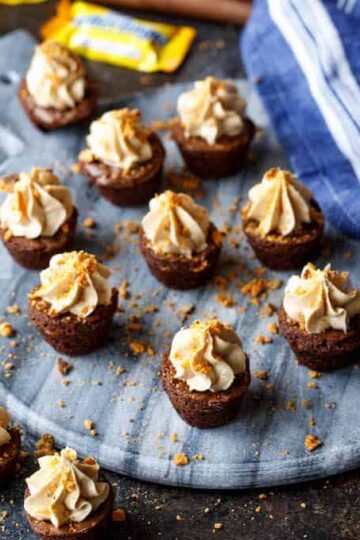 Butterfinger Cheesecake Brownie Bites | sharedappetite.com