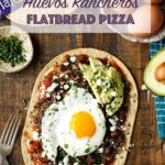 Huevos Rancheros Flatbread Pizza with Monterey Jack Cheese, Salsa, Black Beans, Avocado, and a Fried Egg! sharedappetite.com