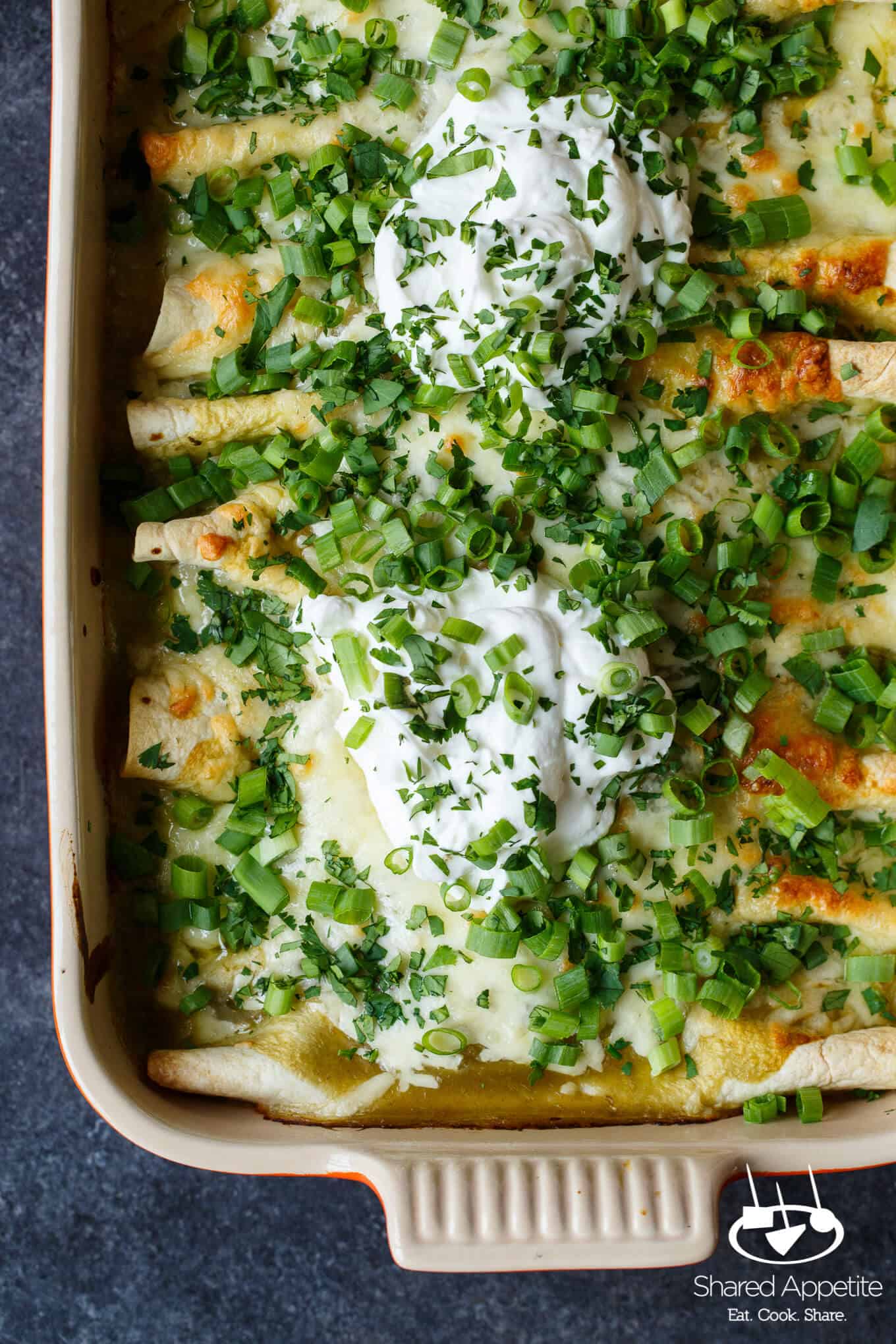 Hidden Veggie Chicken Enchiladas with Zucchini, Spinach, and Corn in a Green Chile Sauce are Family Friendly! | sharedappetite.com