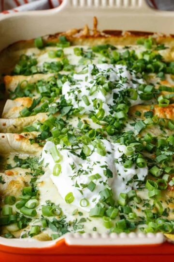 Hidden Veggie Chicken Enchiladas with Zucchini, Spinach, and Corn in a Green Chile Sauce are Family Friendly! | sharedappetite.com