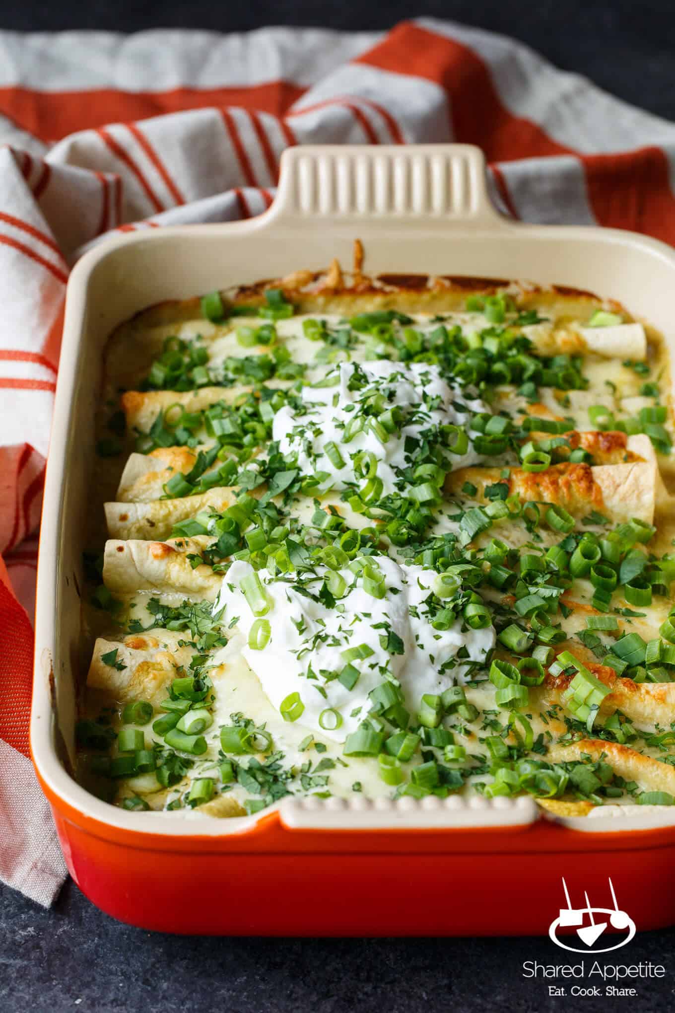 Hidden Veggie Chicken Enchiladas with Zucchini, Spinach, and Corn in a Green Chile Sauce are Family Friendly! | sharedappetite.com
