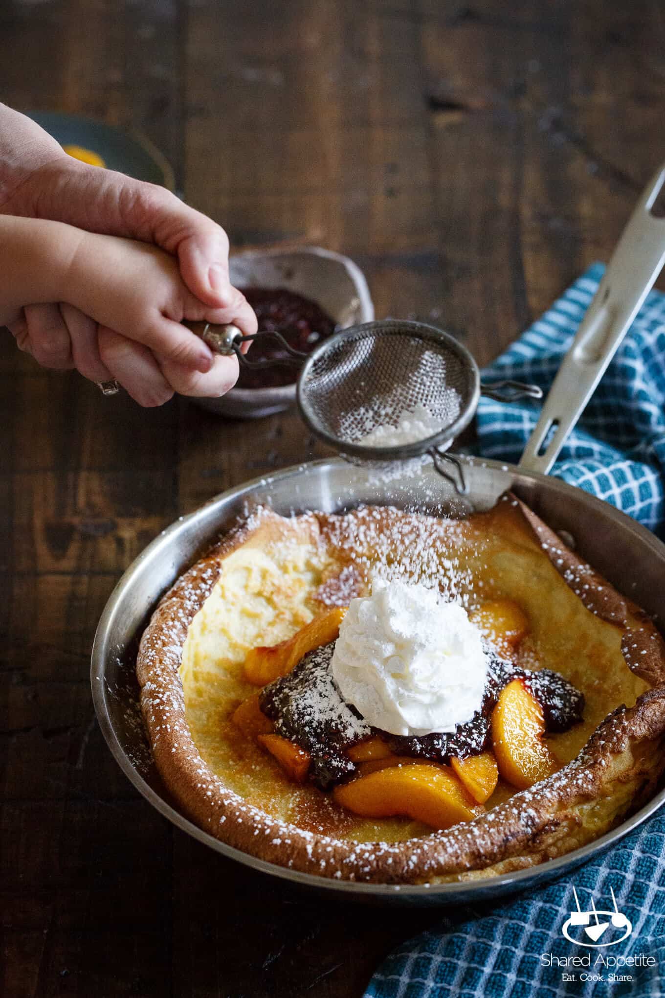 Peach Melba Dutch Baby Pancake | sharedappetite.com