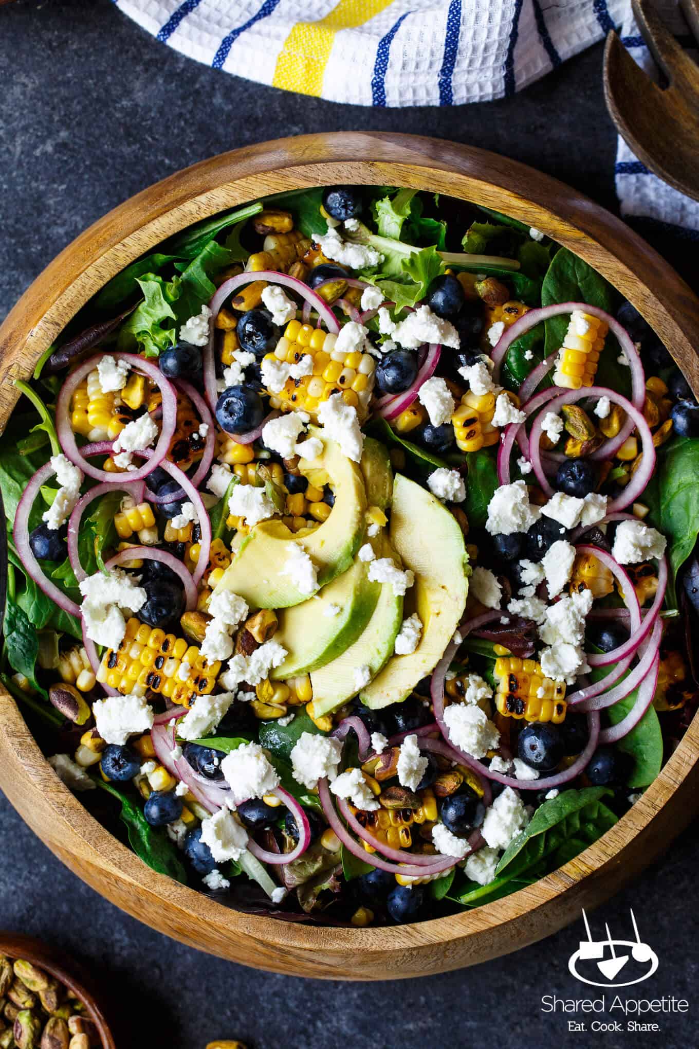 Blueberry, Corn, and Goat Cheese Salad with quick pickled onions, avocado, pistachios, and a bright lemon vinaigrette | sharedappetite.com