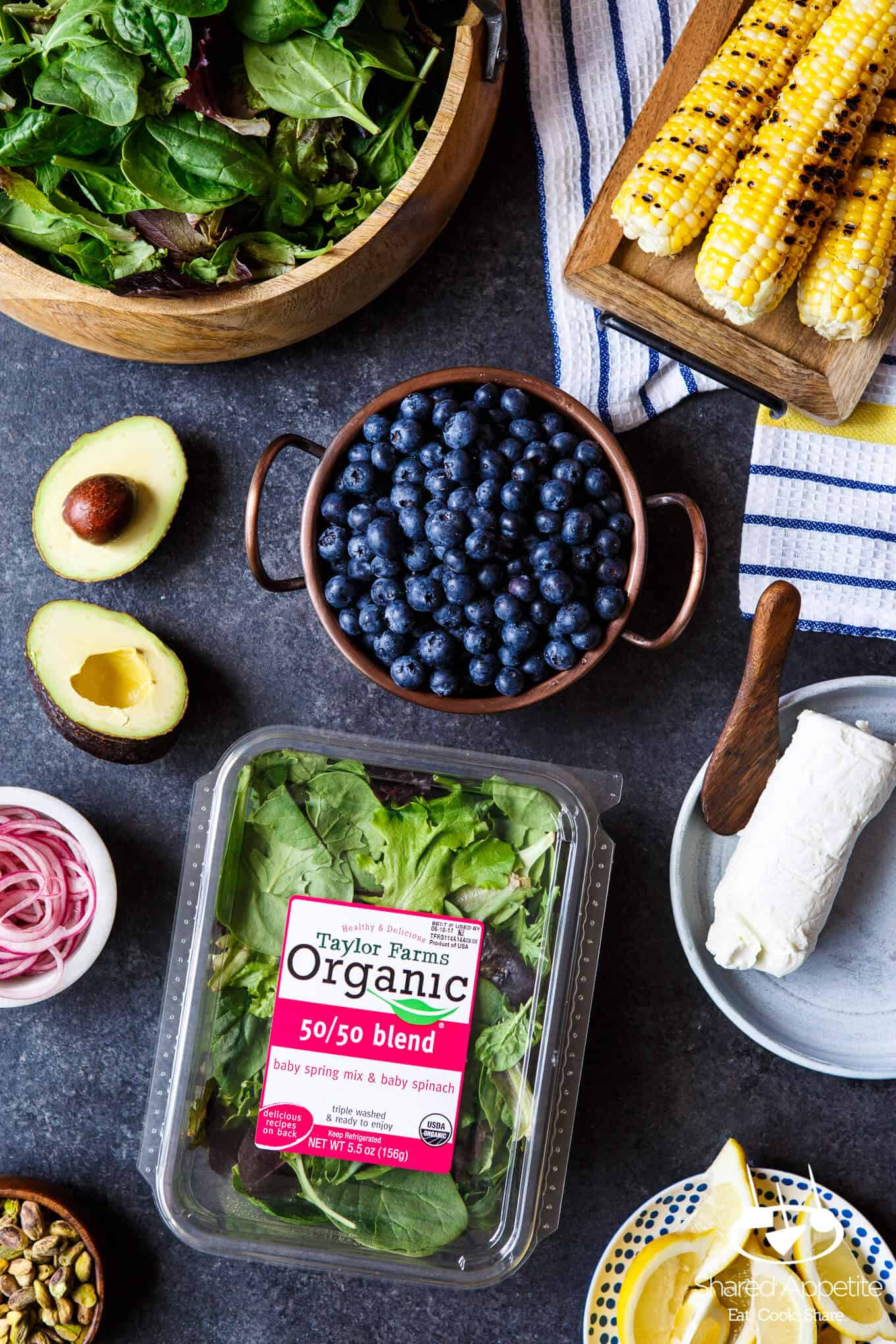 Blueberry, Corn, and Goat Cheese Salad with quick pickled onions, avocado, pistachios, and a bright lemon vinaigrette | sharedappetite.com