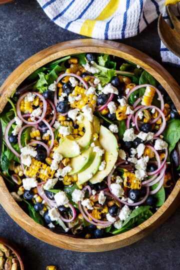 Blueberry, Corn, and Goat Cheese Salad with quick pickled onions, avocado, pistachios, and a bright lemon vinaigrette | sharedappetite.com