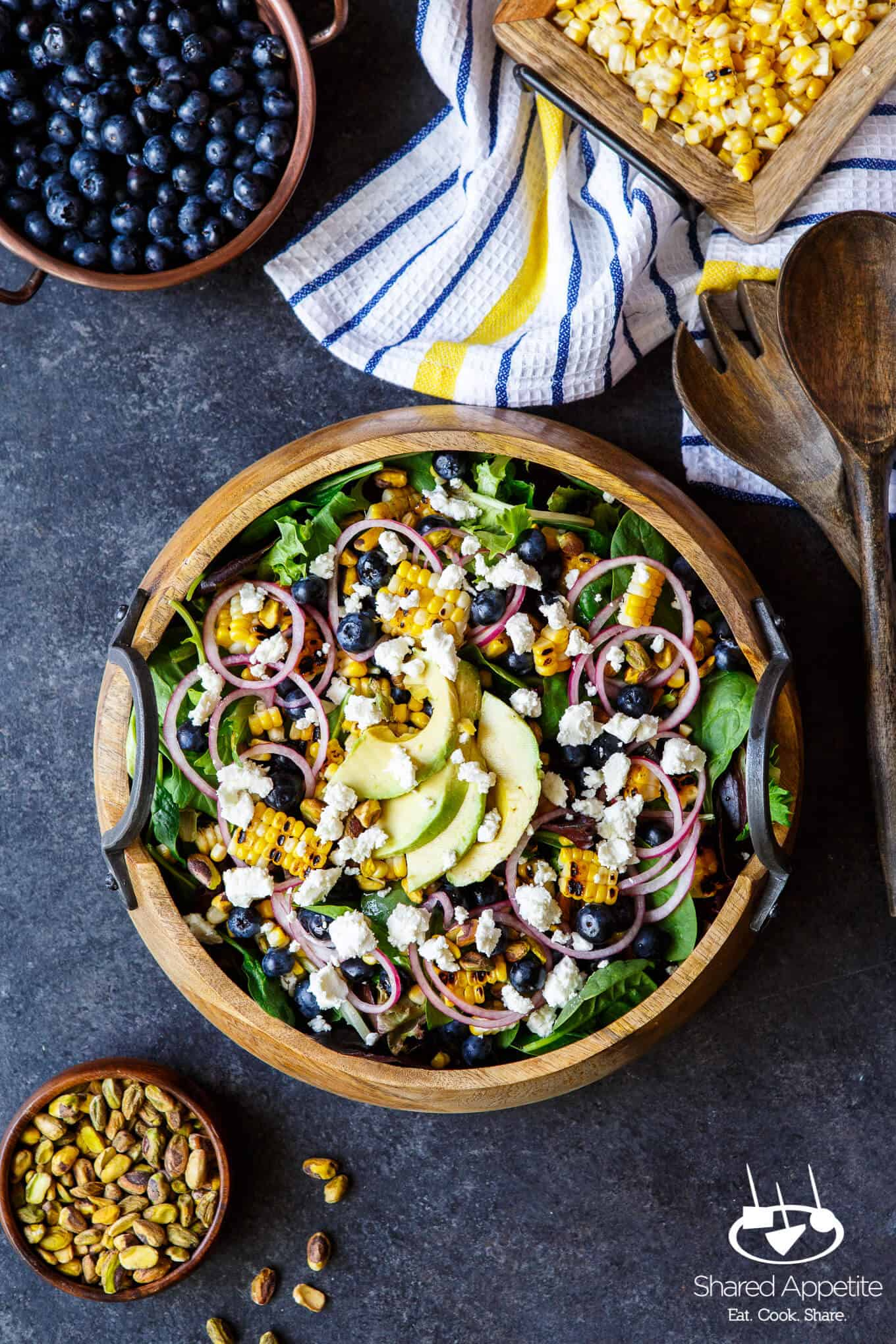 Blueberry, Corn, and Goat Cheese Salad with quick pickled onions, avocado, pistachios, and a bright lemon vinaigrette | sharedappetite.com