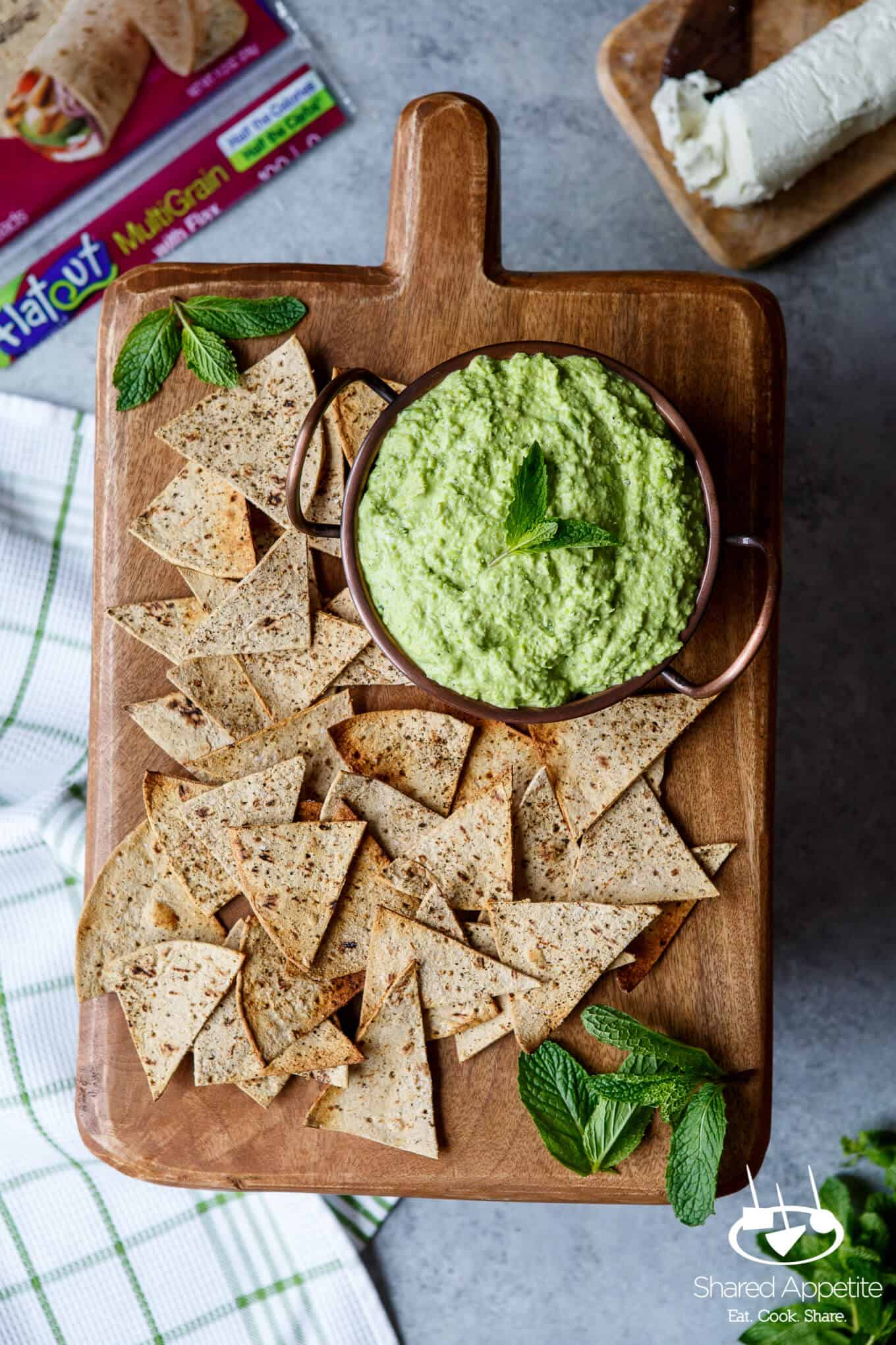 Just a handful of ingredients and 5 minutes stands between you and this easy entertaining recipe for Sweet Pea Goat Cheese Dip with lemon and mint! Perfect for Spring!