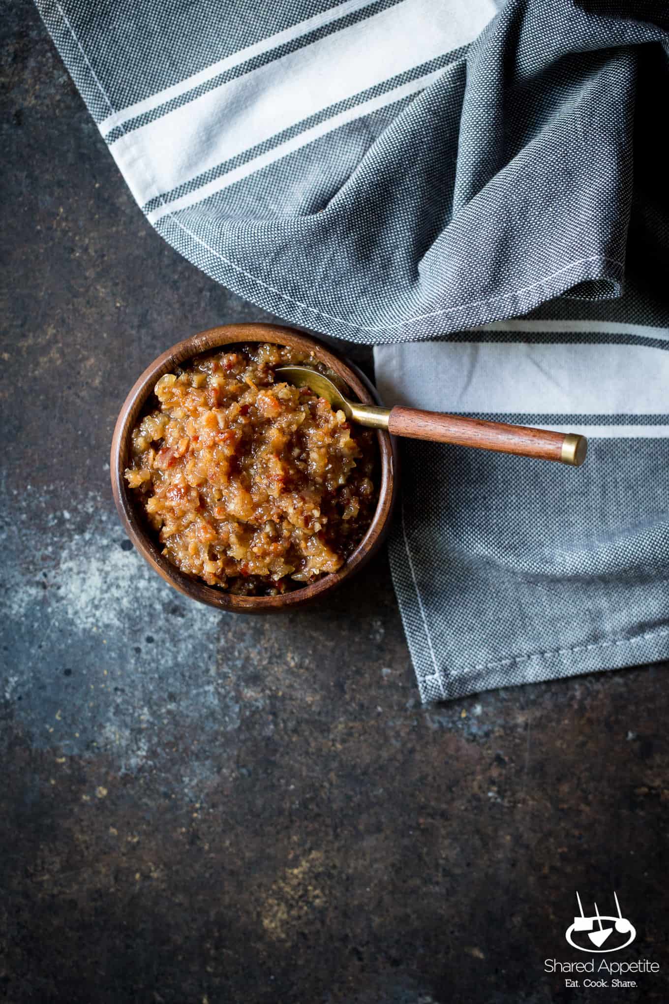 Bacon Jam made with onions, bacon, and apple juice! The perfect condiment for avocado toast, burgers, and goes great with eggs! Full recipe on sharedappetite.com