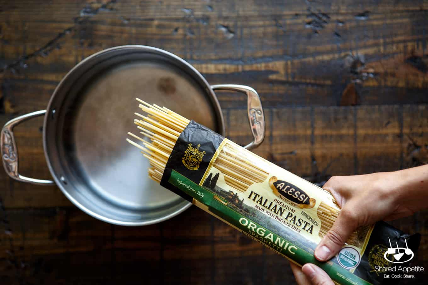 Putting the Spaghetti in the Water for Summer Vegetable Pasta with Arugula Pesto | sharedappetite.com