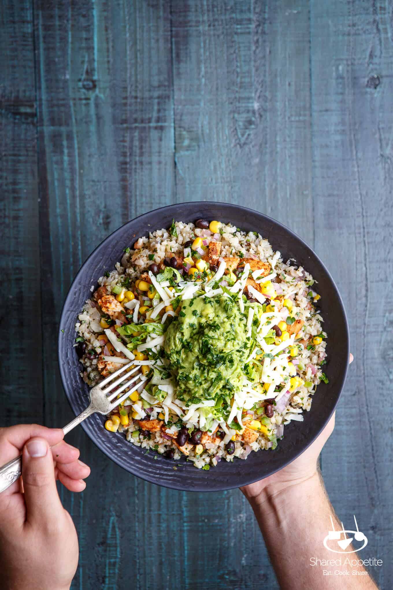 Eating with a fork the Healthy Cauliflower Rice Burrito Bowls | sharedappetite.com