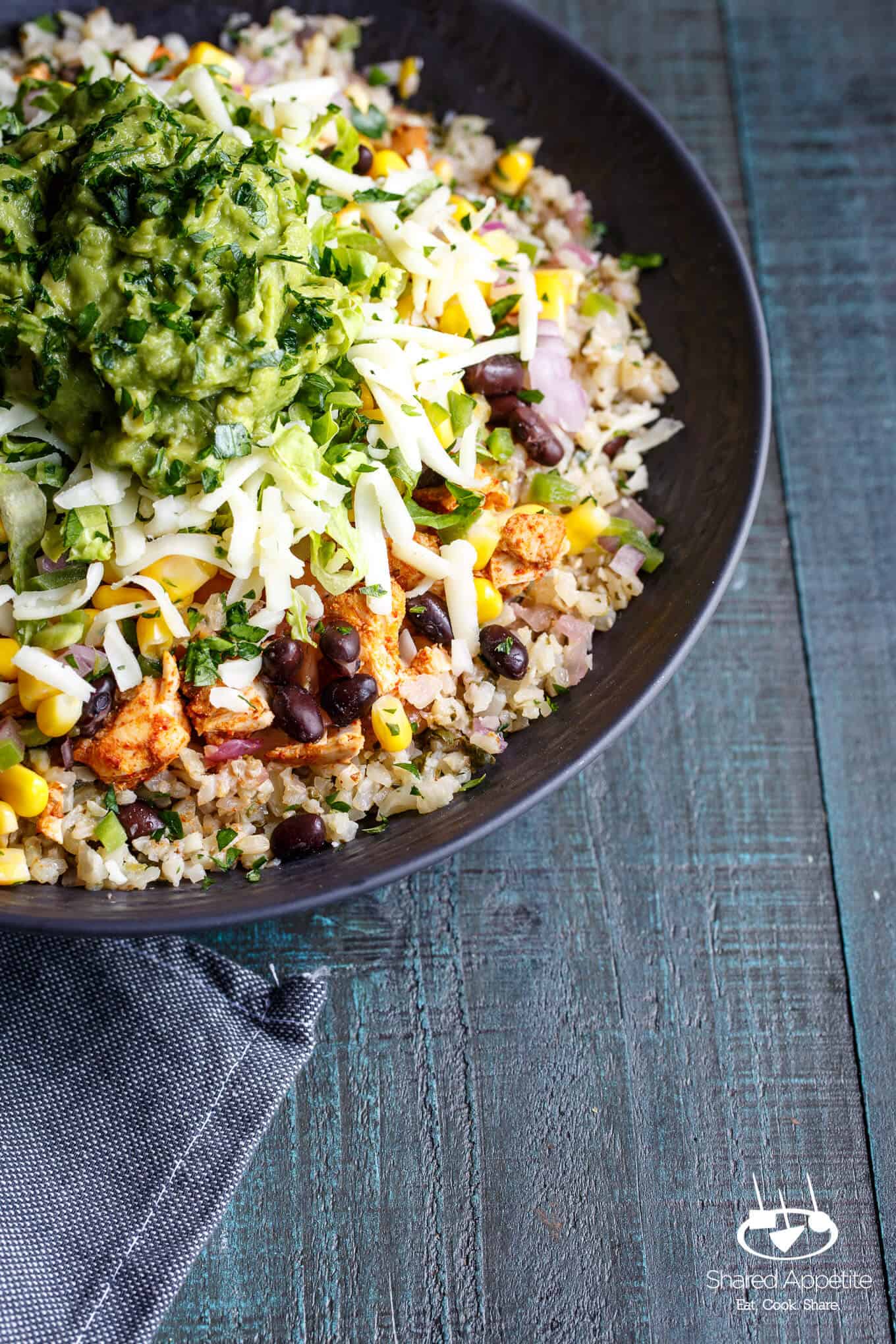 up close shot of the Healthy Cauliflower Rice Burrito Bowls | sharedappetite.com