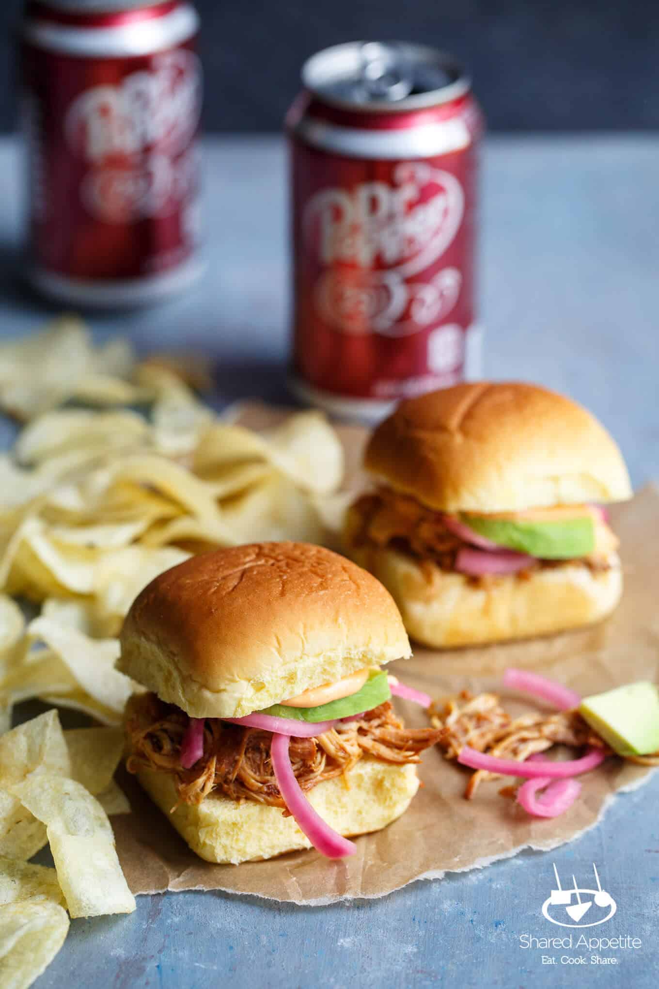 Slow Cooker Dr. Pepper BBQ Pulled Chicken Sliders with Avocado, Sriracha Mayo, and Pickled Onions | sharedappetite.com