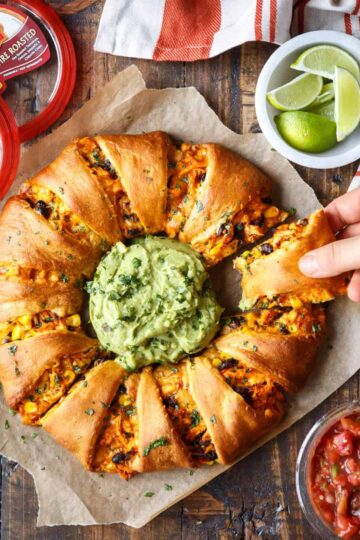 Grabbing a slice of the Chicken Enchilada Crescent Ring | sharedappetite.com