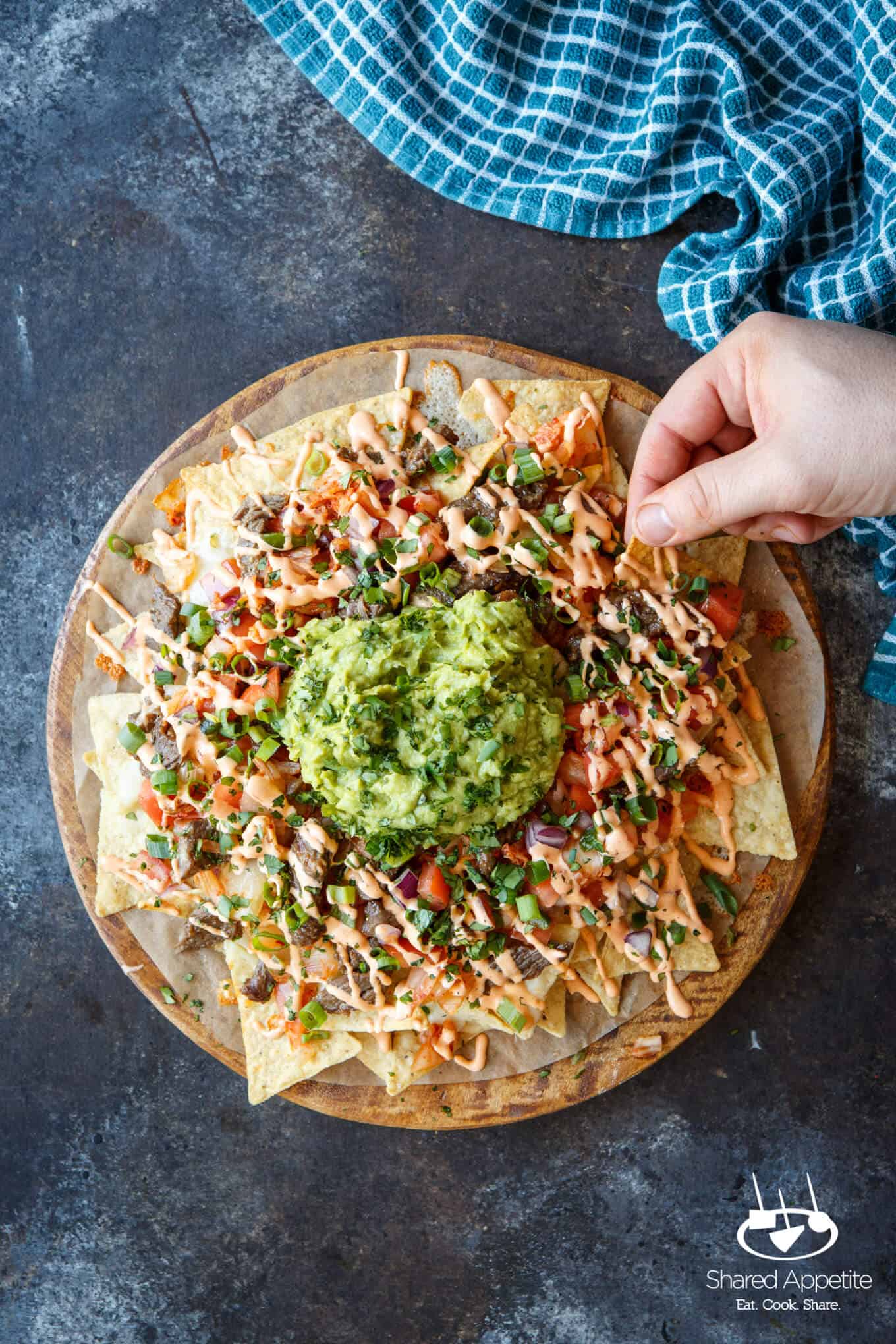 Bulgogi Korean Steak Nachos with Kimchi and Gochujang Aioli | sharedappetite.com