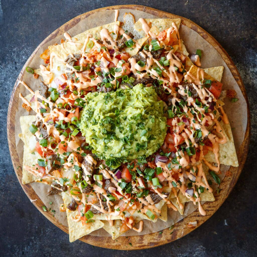 Bulgogi Korean Steak Nachos with Kimchi and Gochujang Aioli