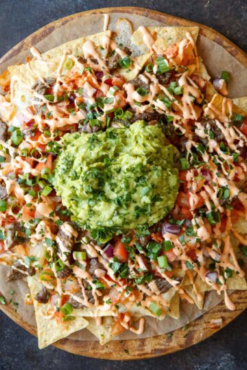 Bulgogi Korean Steak Nachos with Kimchi and Gochujang Aioli | sharedappetite.com