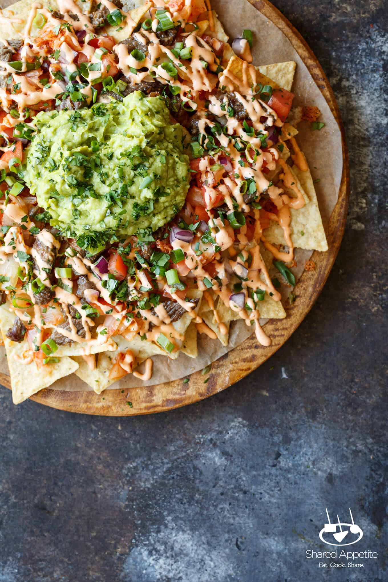 Bulgogi Korean Steak Nachos with Kimchi and Gochujang Aioli | sharedappetite.com