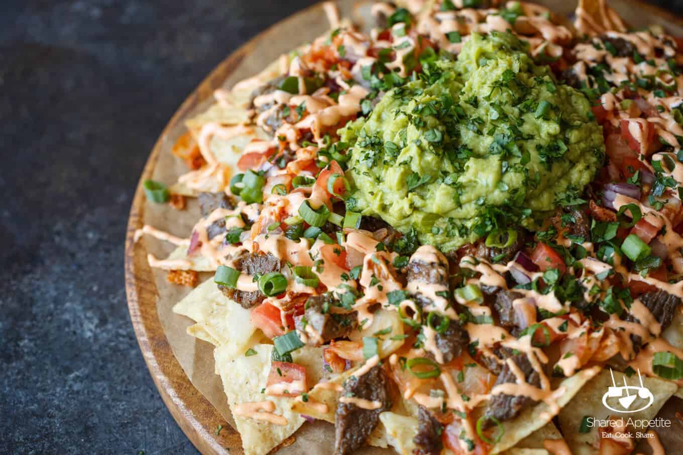 Bulgogi Korean Steak Nachos with Kimchi and Gochujang Aioli | sharedappetite.com