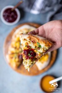 Closeup of a slice of Leftover Thanksgiving Pizza | sharedappetite.com