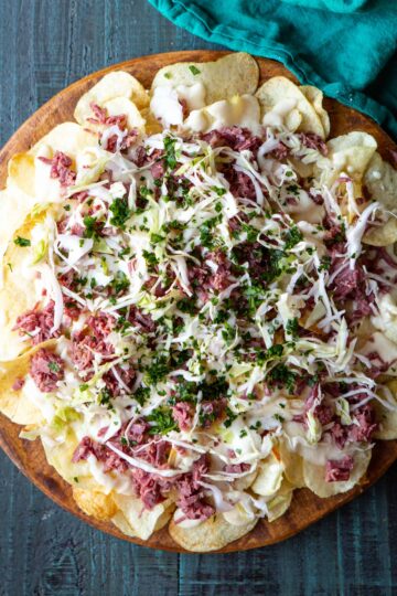 Irish Corned Beef Nachos with Swiss Cheese Queso and Pickled Cabbage for St. Patrick's Day | sharedappetite.com