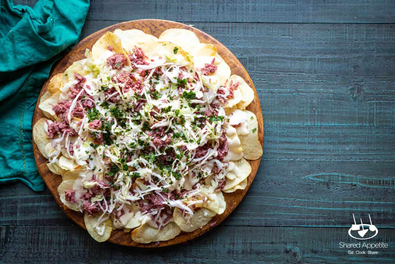 Irish Corned Beef Nachos with Swiss Cheese Queso and Pickled Cabbage for St. Patrick's Day | sharedappetite.com