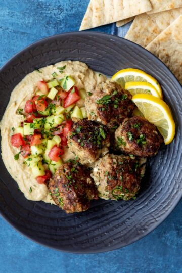 Greek Chicken Meatballs with Hummus and Israeli Salad | sharedappetite.com